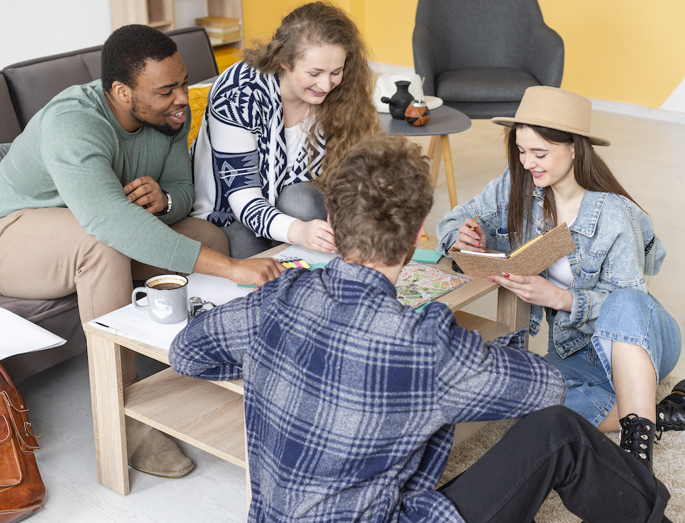 Solo traveler making new friends at a social event in Europe.